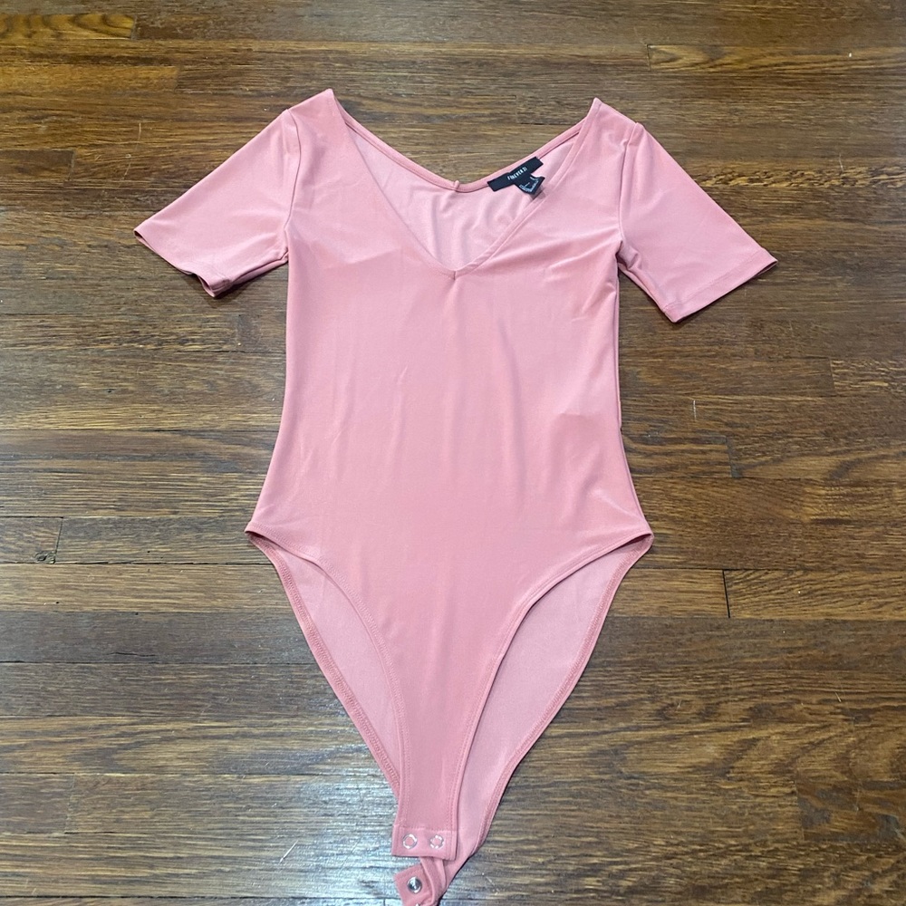 Baby pink Lycra bodysuit